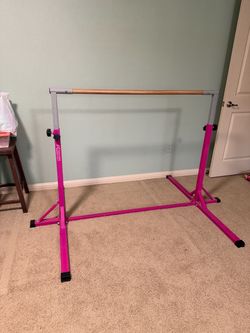 Expandable gymnastics bar