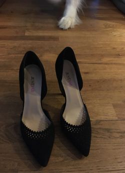 From Just Fab size 6 1/2 worn once in a wedding only for ceremony. The shoes have eyelet scalloping around the top black suede material.