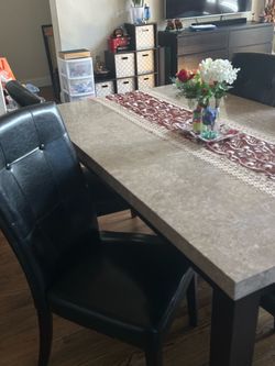 Dining table with 5 faux leather chairs