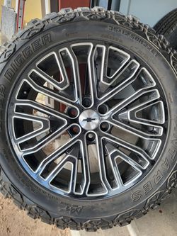 Denali 22s Wheels On 35s Mud Terrain Tires.