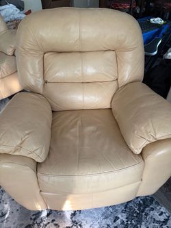 Yellow reclining sofa with at matching rocking recliner
