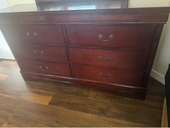 Wooden six drawer dresser with mirror