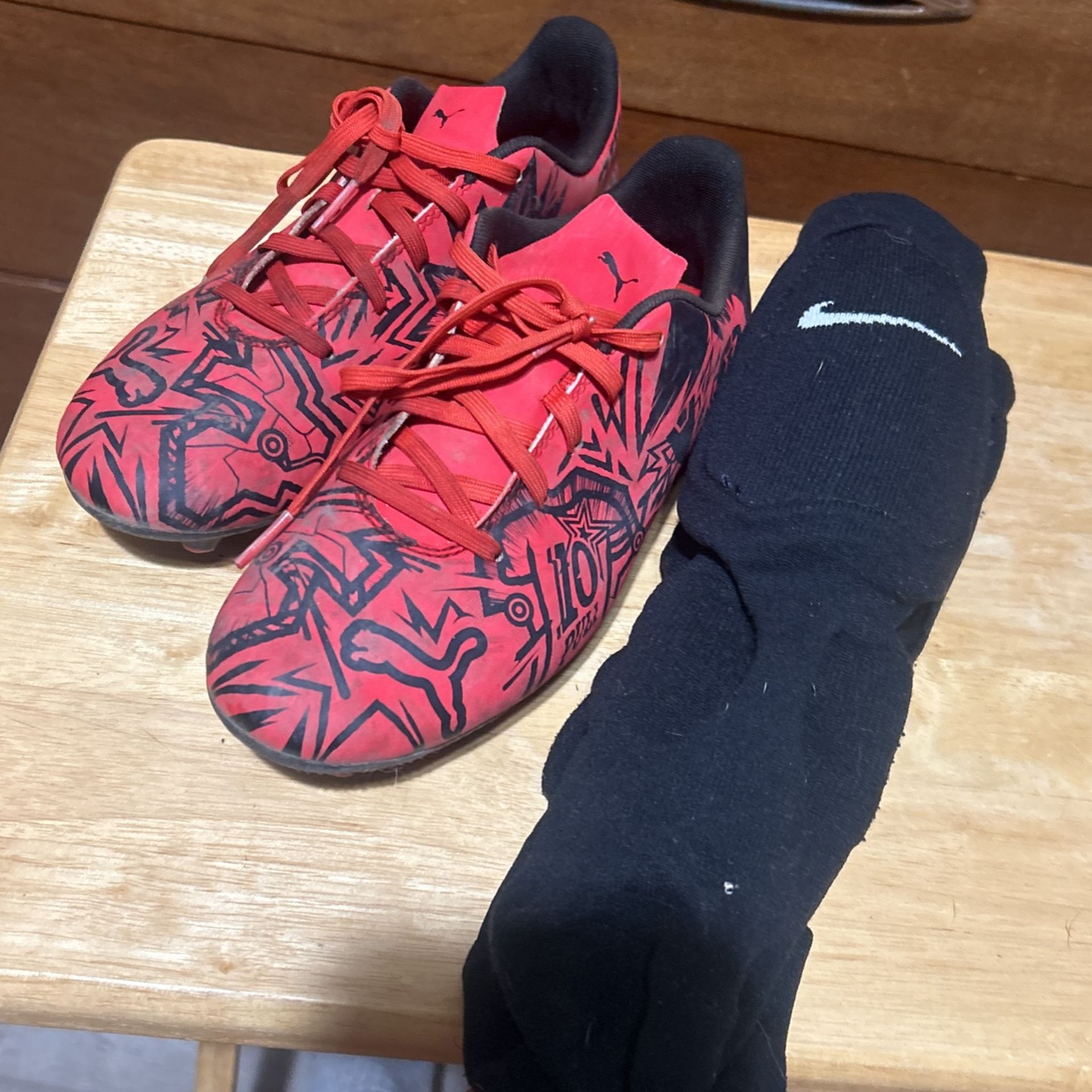 Puma soccer, cleats, and Nike shinguards