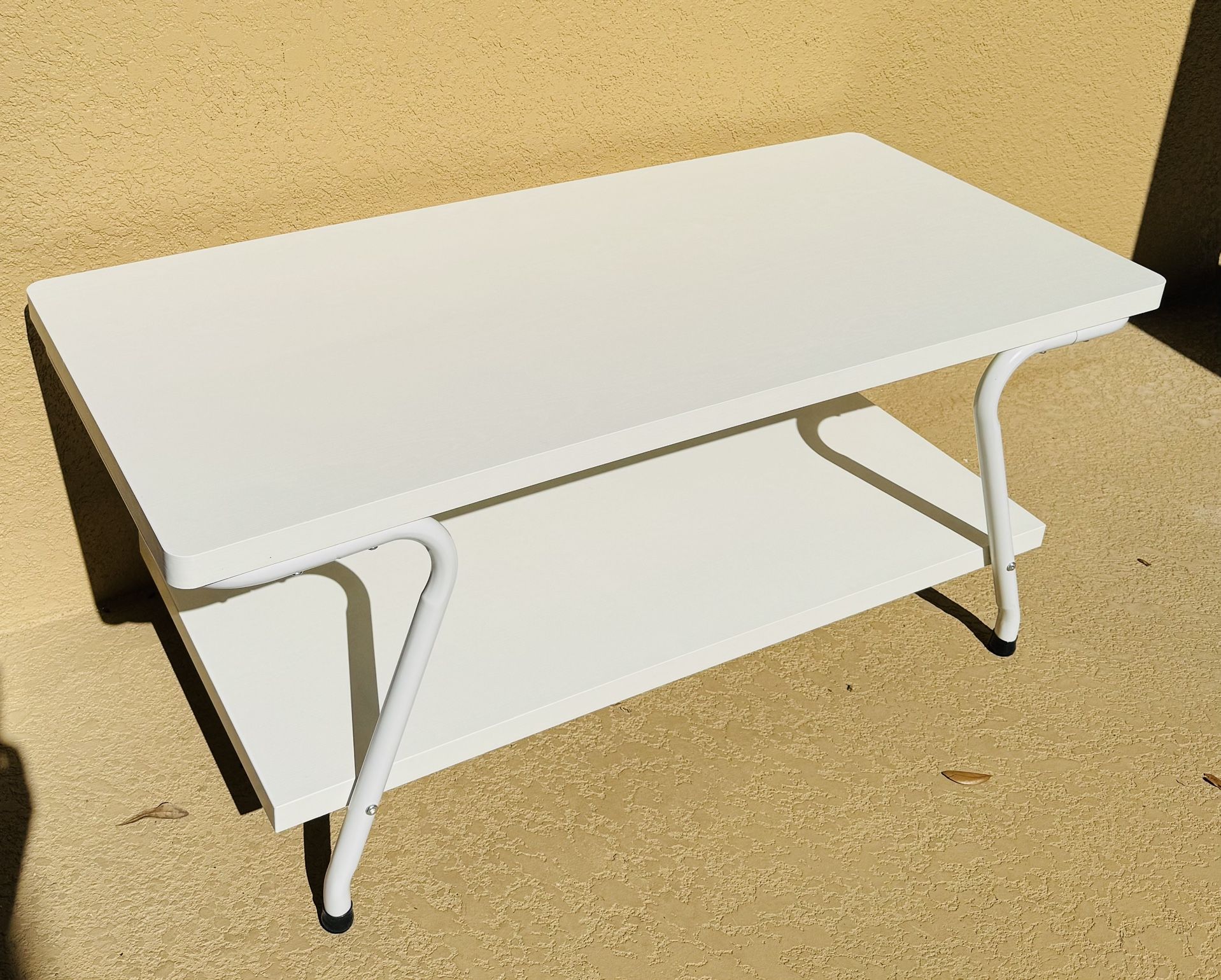 43” White Coffee Table -New -Never used but has Minor wear-size in pics -delivery is available $30 Price is Firm 