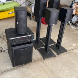  MK Speakers (5) With Stands. One MK Woofer And Denon Receiver