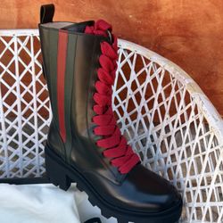 Gucci black boots with red laces  