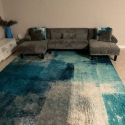 Nice Rug and Couch With Pillow Inserts