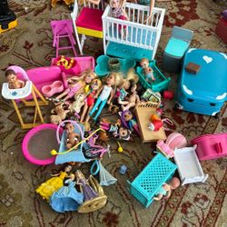 Lot of baby dolls, accessories, Barbie dolls, and princesses