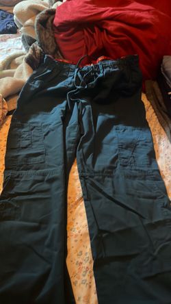 Teal scrub set pants and button down jacket
