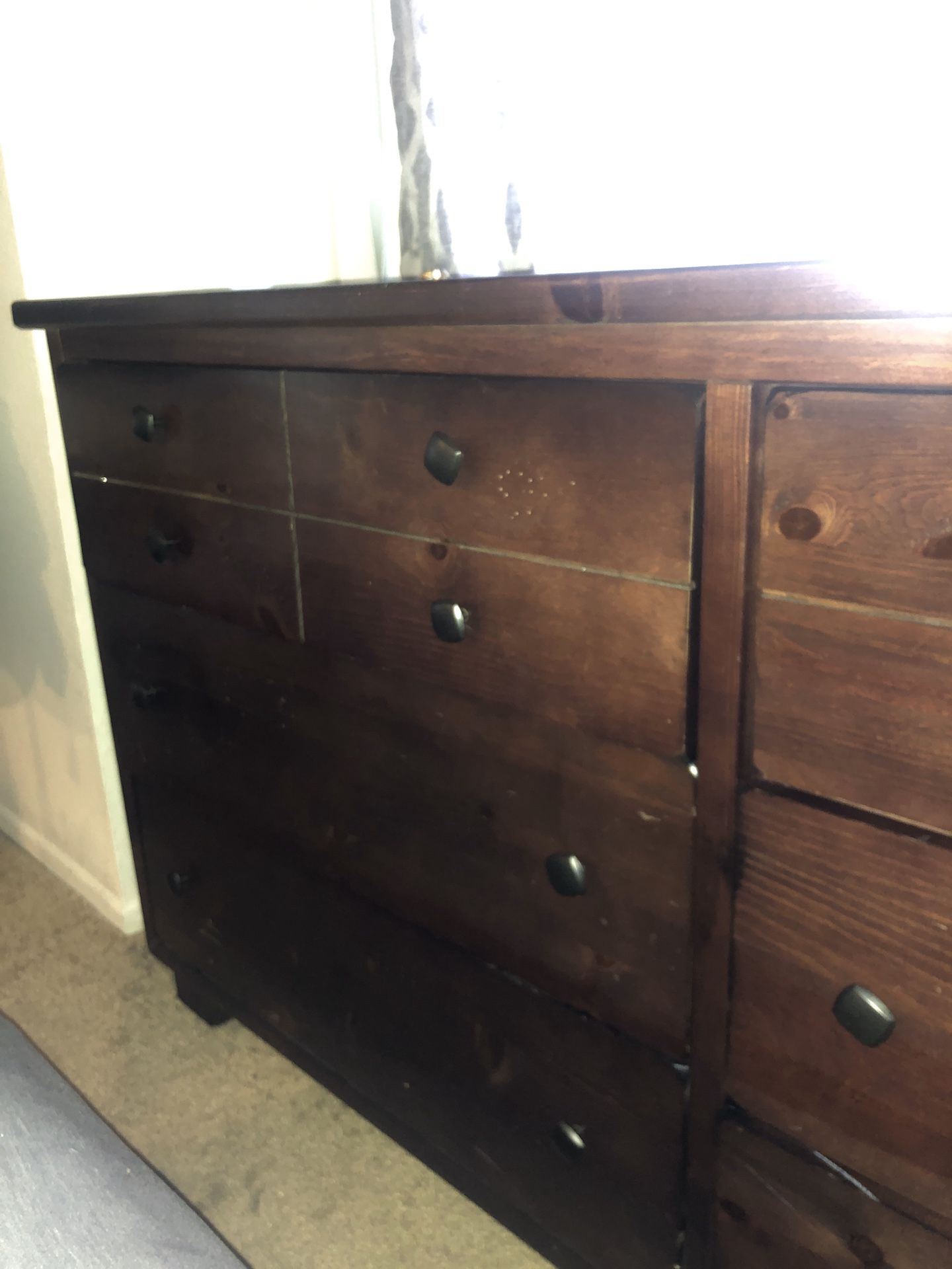 Brown dresser with mirror