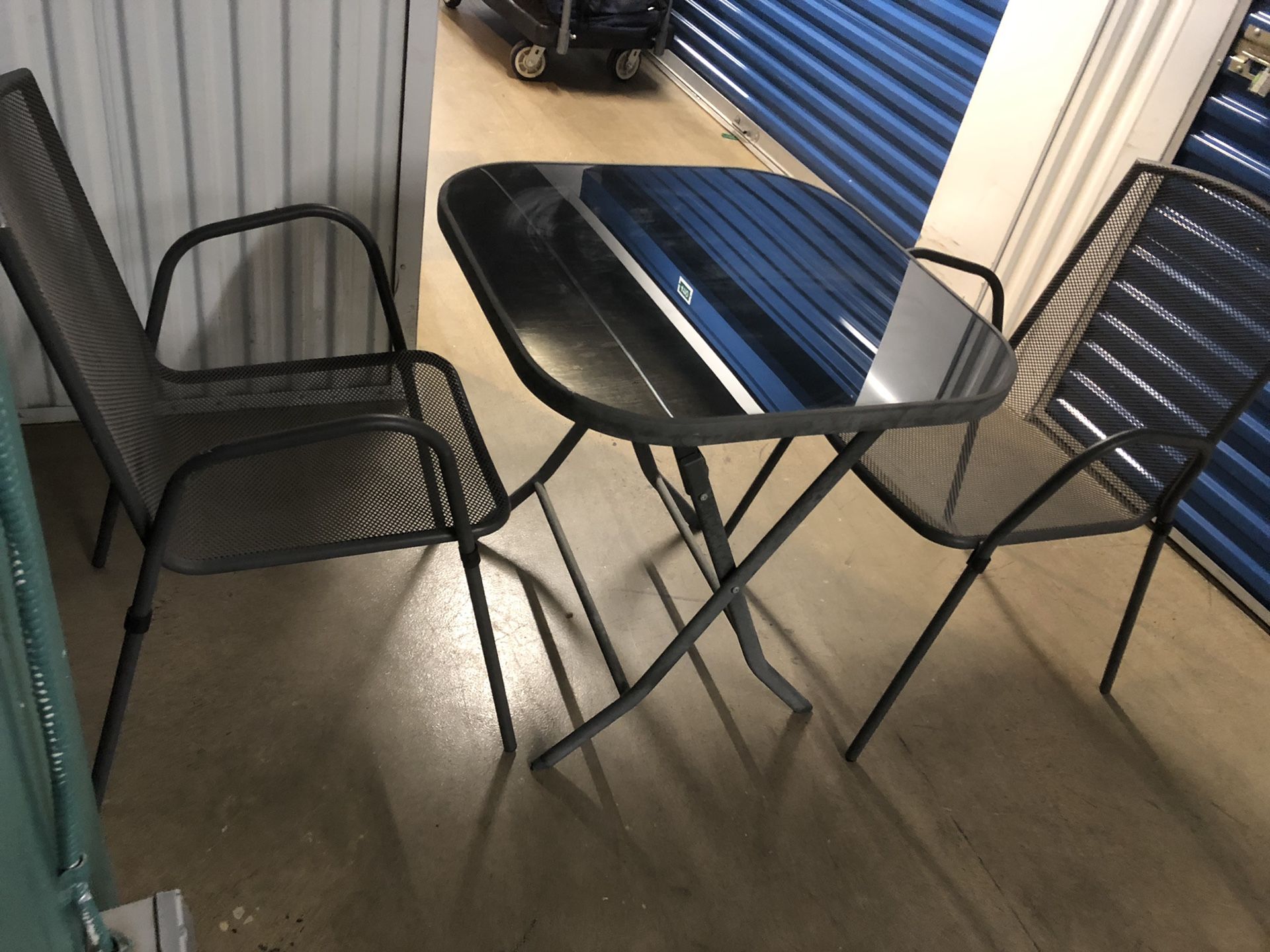 Folding patio table and 2 stackable chairs