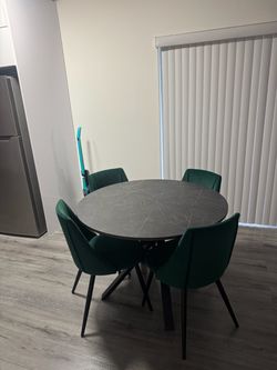 Round Marble-Look Dining Table + 4 Green Velvet Chairs