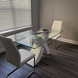 Glass Pedestal Dining table