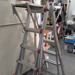 LITTLE GIANT LADDER WITH EXTRA ADD ONS. MADE IN AMERICA. $150 FIRM. ORANGE 🍊 FIRM ON PRICE WILL NOT RESPOND TO OFFERS LESS THAN $150
