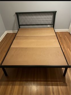 Black metal queen size platform bed