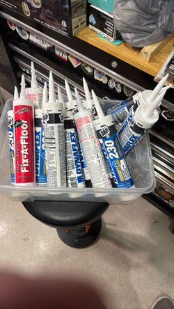 Lot Of White Caulking And Floor Adhesive