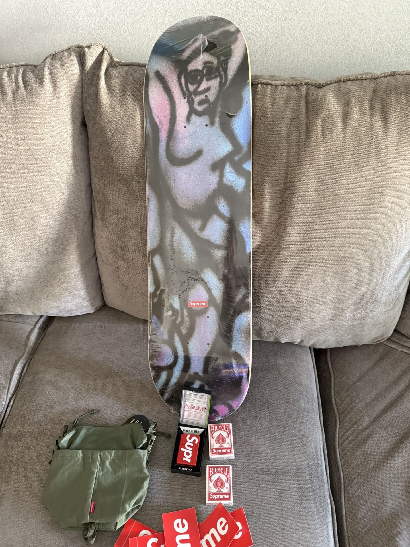 SUPREME SKATE DECK , POUCH, ZIPPO. 2 DECK CARDS