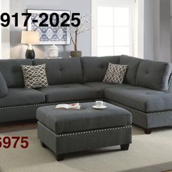 BLUE GREY SECTIONAL WITH ACCENT STUDDING. OTTOMAN INCLUDED 
