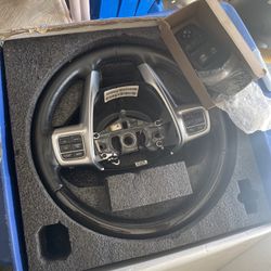Corvette OEM steering wheel with multifunction controls (audio, cruise, phone), removed and boxed,