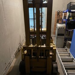 stand behind forklift 