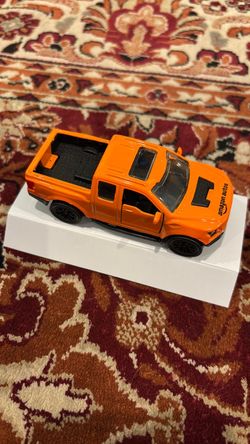 Amazon 2026 orange truck diecast