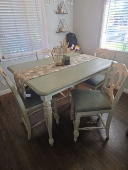 Free Table and 4 chairs.
