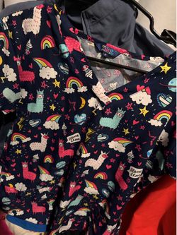 Bag of scrubs tops , pants and more
