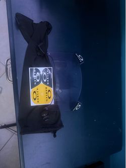BEARLY USED! Oakley prizm visor (comes with stickers and cary bag)