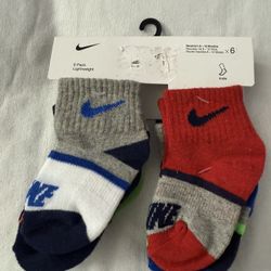 $5 NIKE SOCKS 6 PACK SOCKS 6-12 MONTHS $5 EACH PACK