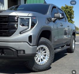 GMC sierra wheels and tire 17” with 35
