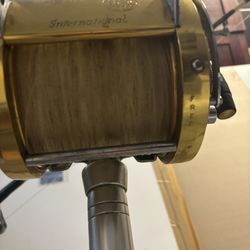 Penn International Reels And Doyle R Harizog Rods In Good Condition Just Dirty 
