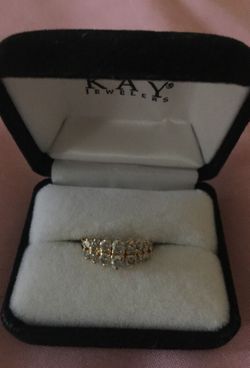 14 Kt gold 14 diamond anniversary ring 1 Kt total weight diamonds