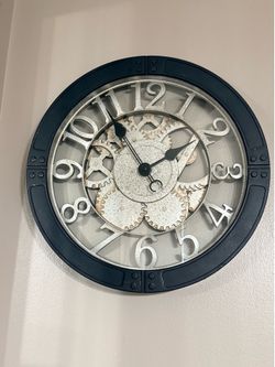 Clock and metal flowers