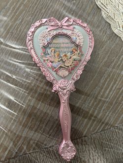 Flower Knows Hand Mirror