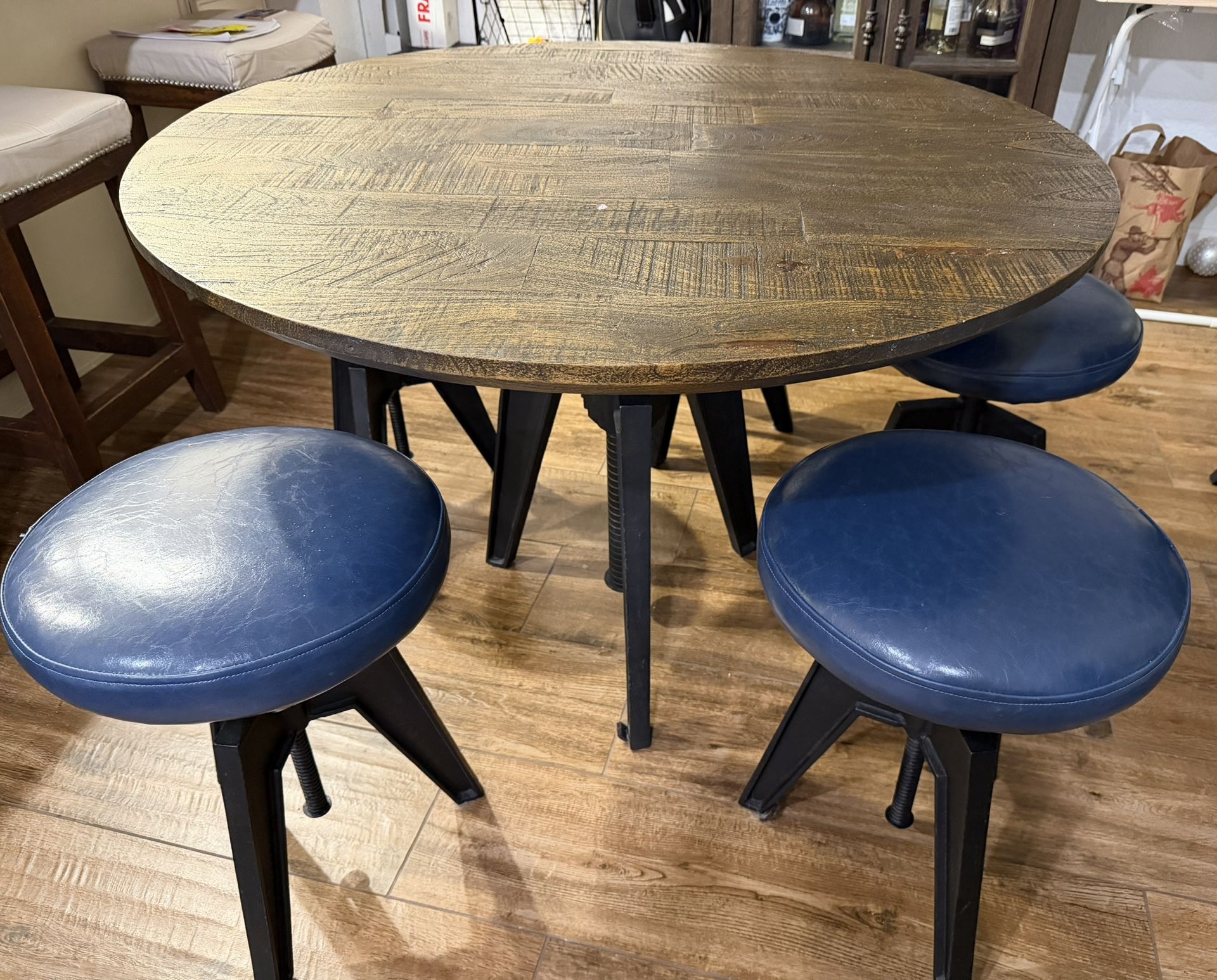 Dining Carnegie Adjustable Round Table & Stools