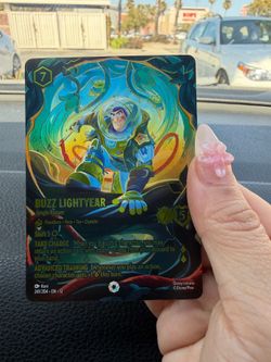Lorcana buzz enchanted card