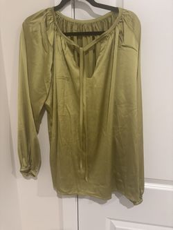 No olive colored blouse the material is really lightweight and soft. I have it in black as well and cream.