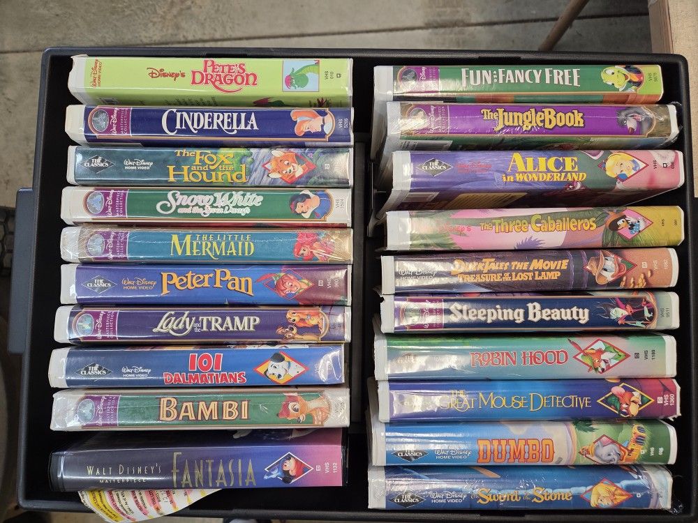 Collection of Disney movies some have never been opened Vhs.