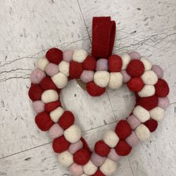 Yarn pompom heart wreath 