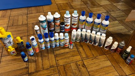 A lot of fish tank cure medicine and fish supplies