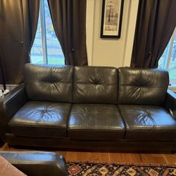 Leather Couch, Chair And Ottoman. 