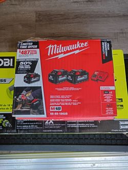 Milwaukee M18 2 batteries and charger