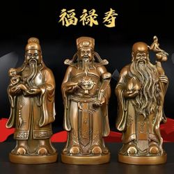 Antique solid brass set of three, featuring the symbols of fortune