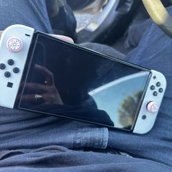 Nintendo Switch Oled. With Hack You Can Download Any Nintendo Game For Free. Come With All accessories.