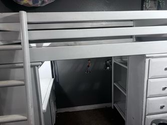 Loft Bed With A Dresser And Desk