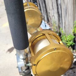 Two PENN Int'l 50 Rod & Reel Combos