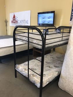 Bunk bed with mattresses