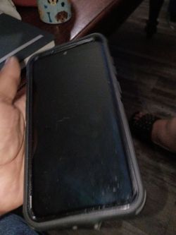 Smartphone in Black Protective Case