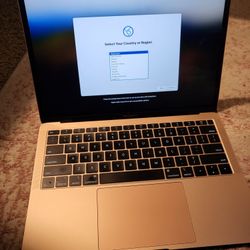 MacBook Air - 13.3" Retina Display - Intel Core i5 - 8GB Memory - 128GB Flash Storage - Gold Model:GSRF MREE2LL/A. Has two small dents in the back. Co