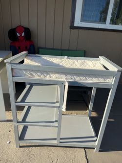 Grey changing table